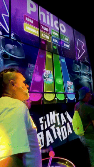 Ativação Beat Hero da Philco no Rock in Rio 2026 com timbaus iluminados e sensores, desenvolvida pela Phygital Solutions junto à Agência Atenas.