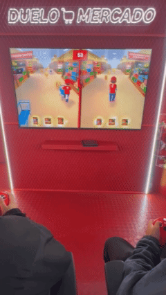 Visitantes jogam Modo Entrega e Duelo Mercado no Stand Bar do iFood, com tablets controlando estoque e prêmios.