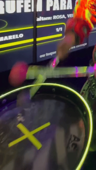 Ativação Beat Hero da Philco no Rock in Rio 2026 com timbaus iluminados e sensores, desenvolvida pela Phygital Solutions junto à Agência Atenas.