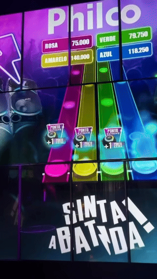 Ativação Beat Hero da Philco no Rock in Rio 2026 com timbaus iluminados e sensores, desenvolvida pela Phygital Solutions junto à Agência Atenas.
