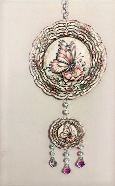 Butterfly wind spinner with hand crafted gifts theme