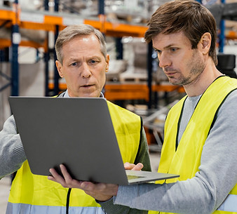 men-warehouse-working-laptop (1).jpg