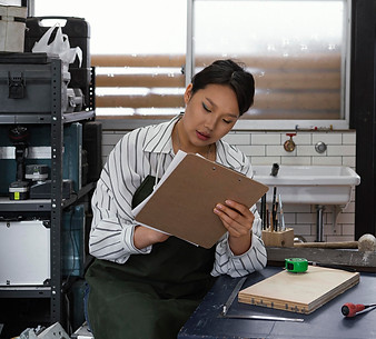 japanese-woman-holding-clipboard-medium-shot.jpg