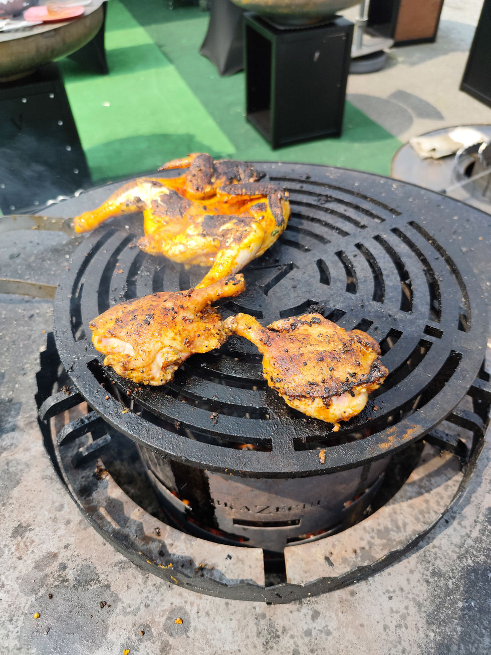 Miniature : grille de cuisson avec cuisse de poulet en cuisson