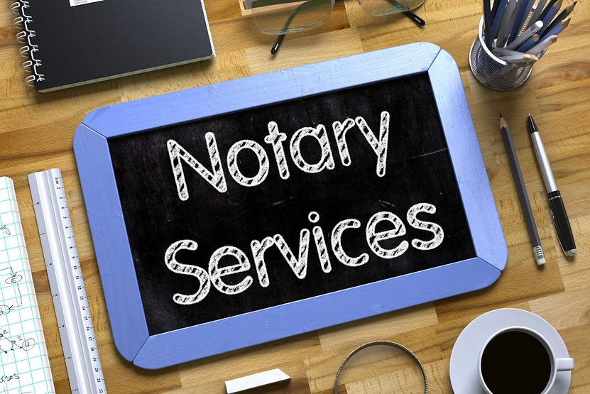 notary-services-desk-pen-book-ruler-glas
