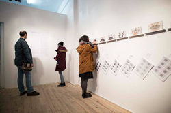 A CLOSE UP OF A PERSON HOLDING A PAIR OF SCISSORS_4