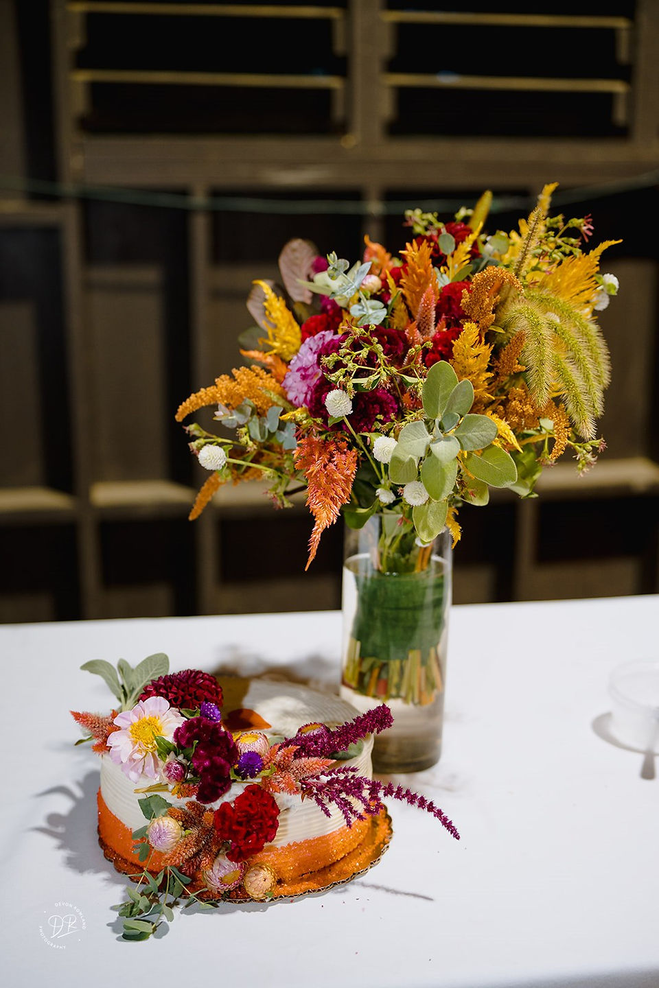 wedding cake with fall flowers