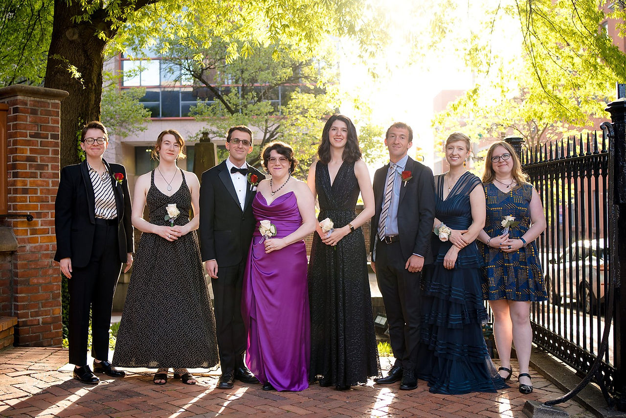 Wedding party with bride n purple dress