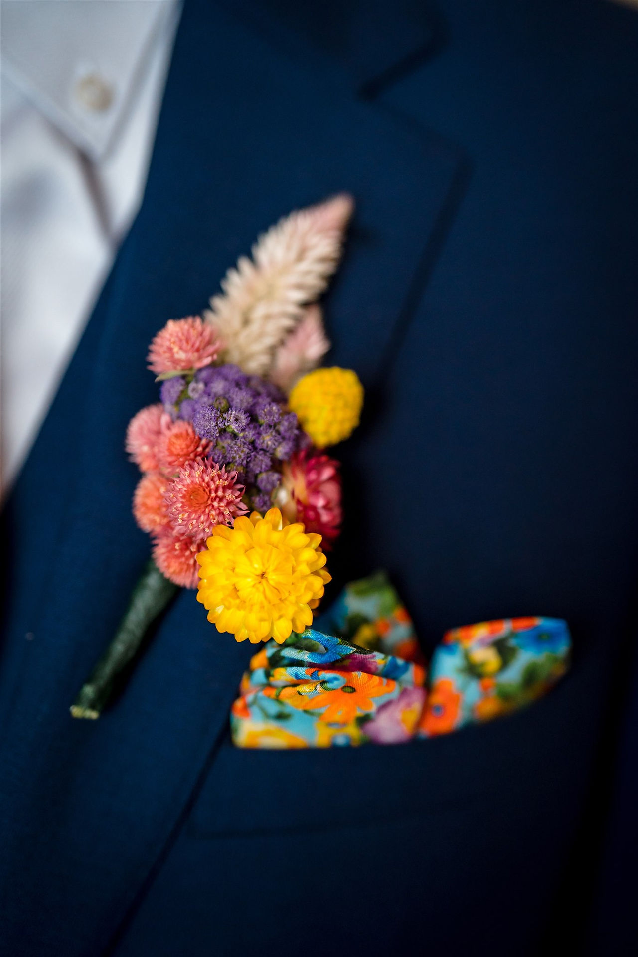 grooms colorful boutonniere
