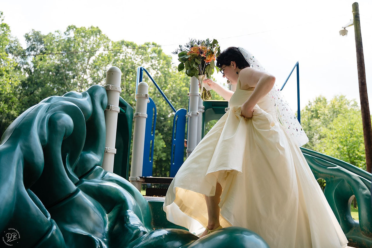 bride climbing kids climber at park