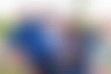 bride and groom with friend