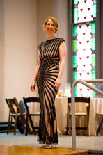 guest in gorgeous black and nude dress