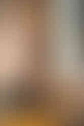 guest in gorgeous black and nude dress