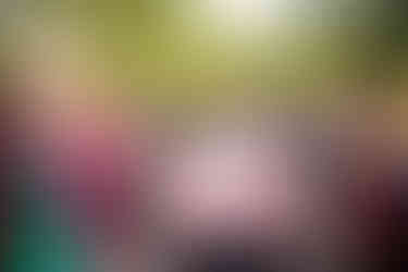 groom in red convertible in baraat