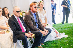 wedding guests in thrift store wedding dress