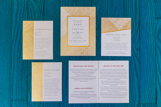 Gold and white wedding invitation suite