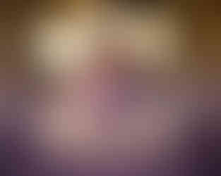 bride and groom in front of pipe organ