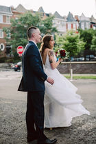 bride and groom walking through DC