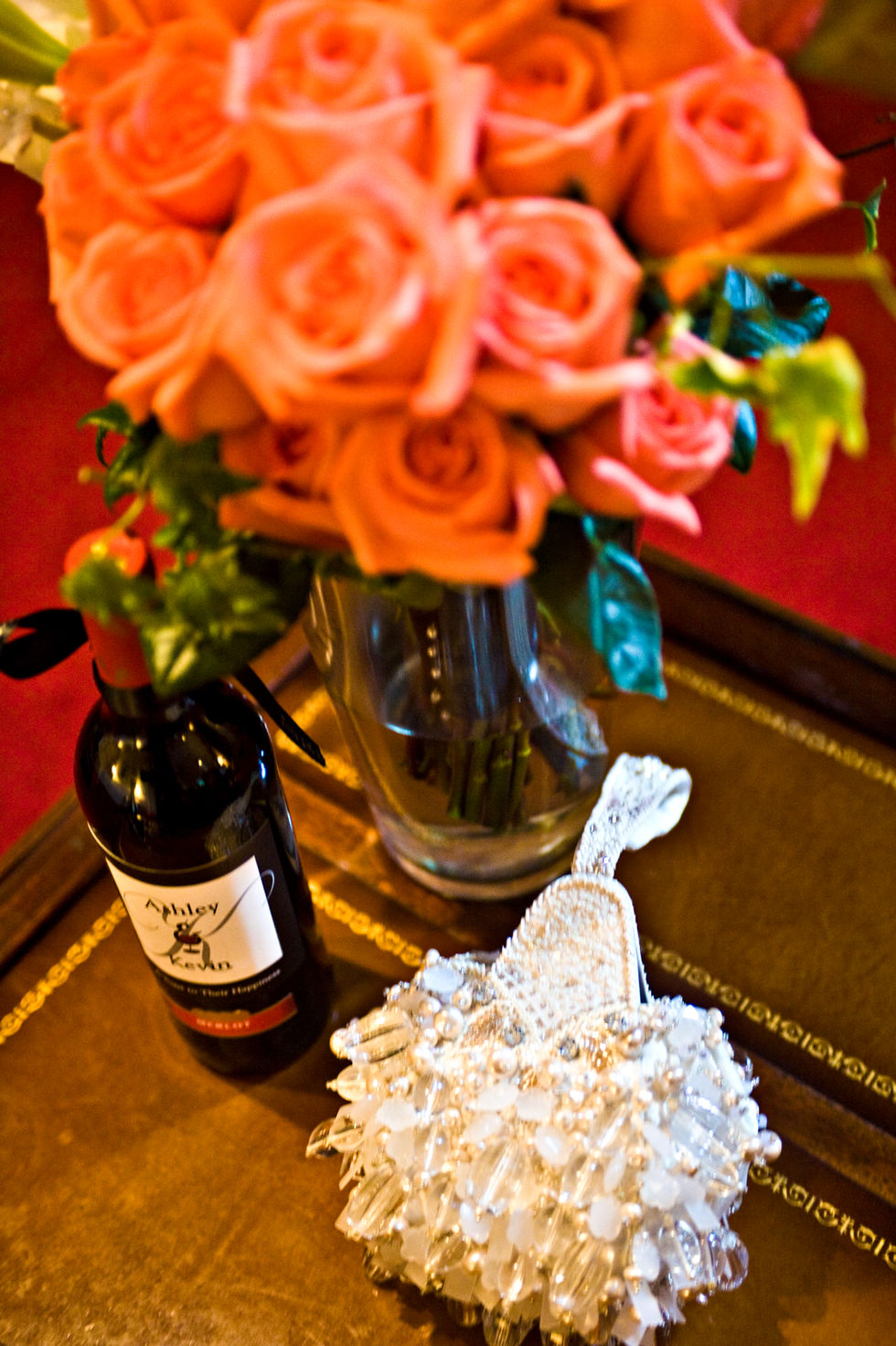 brides pearl bag wine and flowers