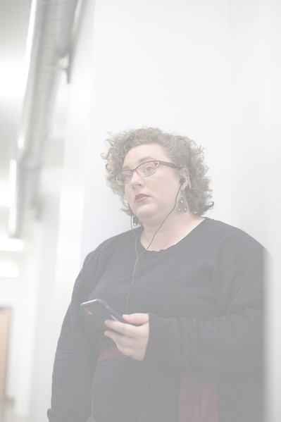 Sad plus size woman on a phone call in a