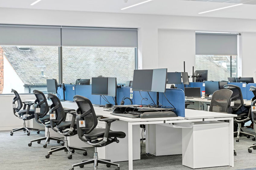 Open plan sustainable office design by Brookhouse with ergonomic seating and efficient layout