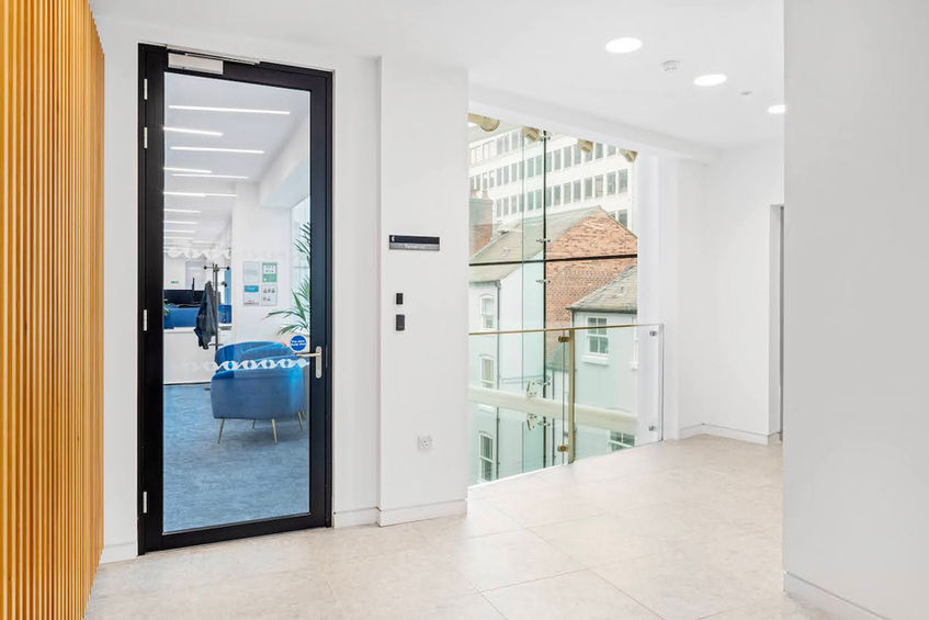 Brookhouse sustainable office design with open circulation areas and energy-efficient lighting