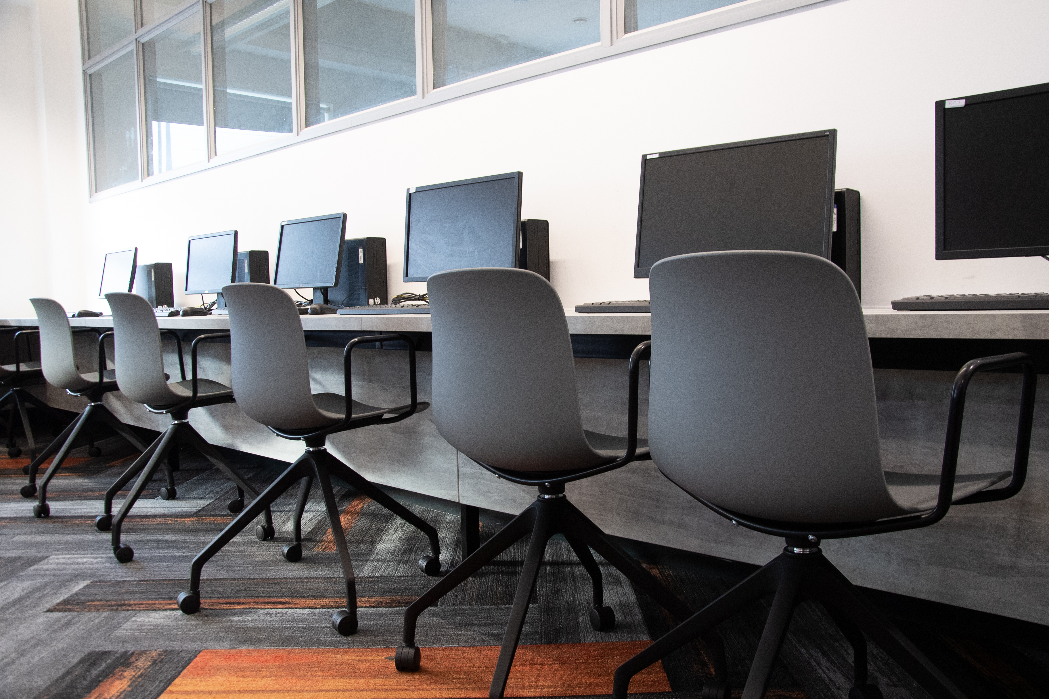Computer desks in a variety of colours, finishes & materials