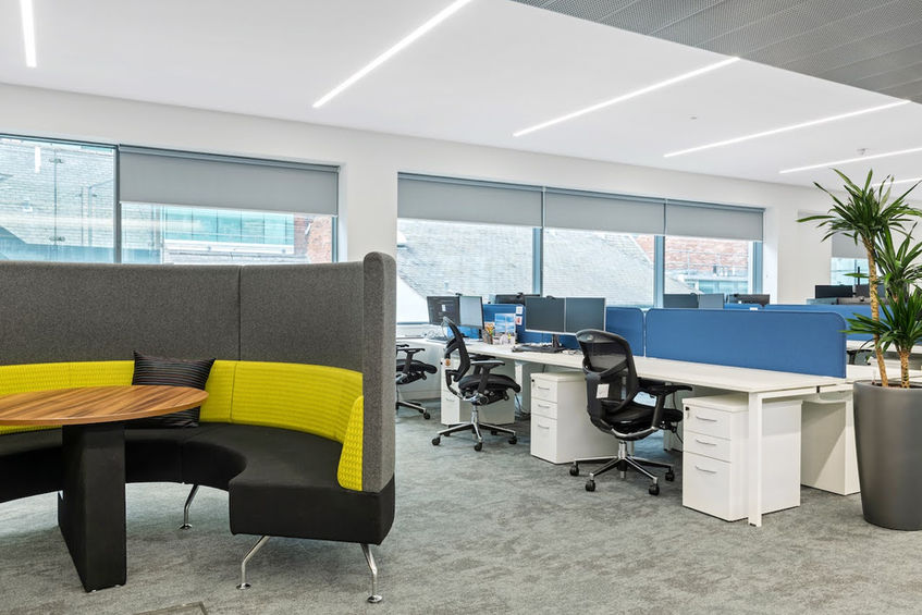 Brookhouse sustainable office interior with collaborative seating and natural light optimisation