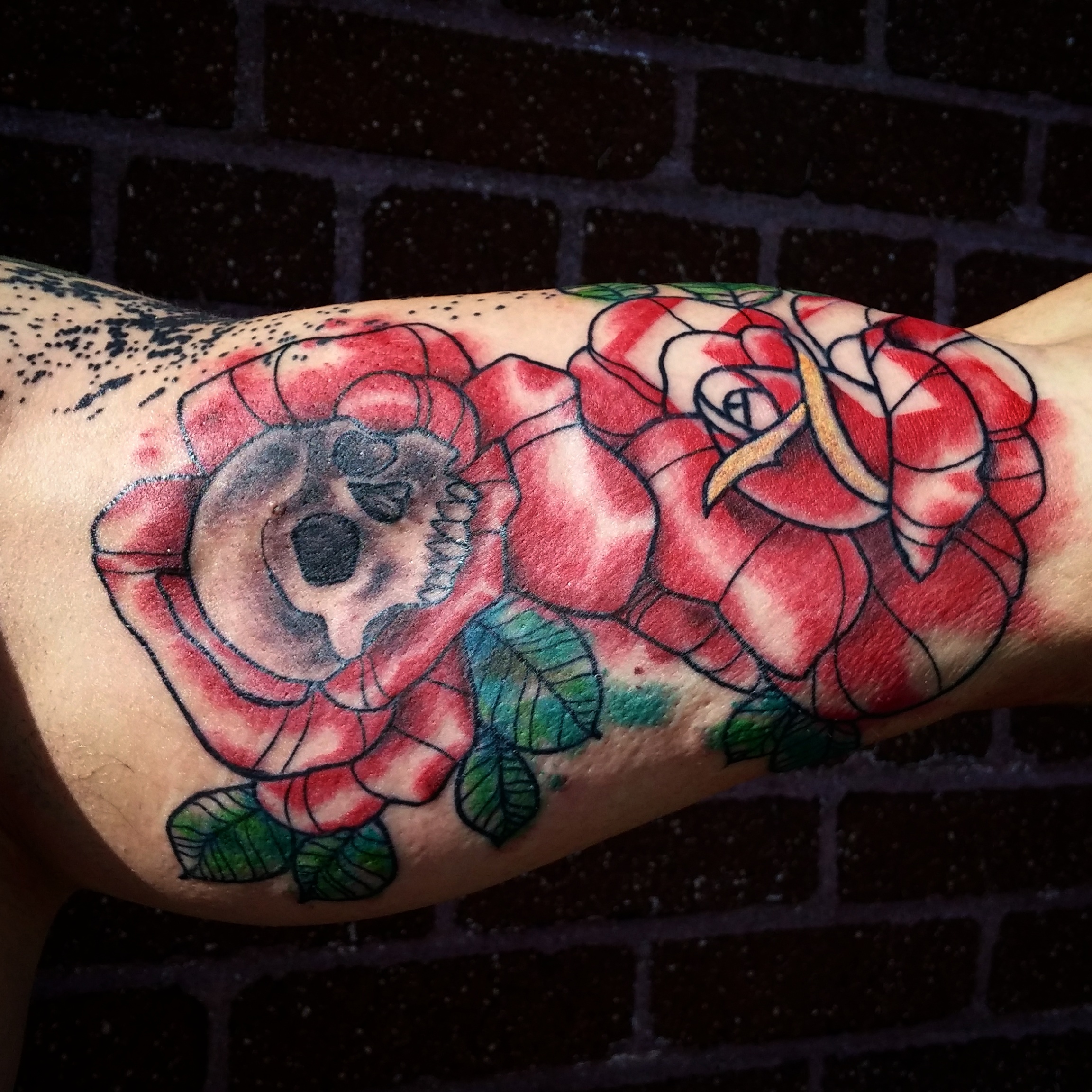 Greg's roses tattoo