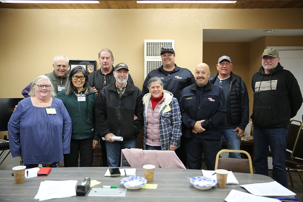 LtoR: Wendy Collins, Cobb View Firewise; Eliot Hurwitz and Magdalena Valderrama, Seigler Springs Firewise and the Seigler Springs Community Redevelopment Association; Dennis Burke, North Coast Opportunities; Gary Prather, Loch Lomond Firewise; Suz-Anna Morandin, Loch Lomond Firewise; Chief Peter Avansino, CALFIRE; Chief Paul Duncan, CALFIRE; Michael Peterson, Loch Lomond Firewise; and Bruno Walther, Loch Lomond Firewise.