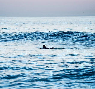 Intermediate Surfer in a Surf Coaching Session