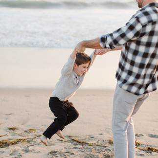Candid photo of a family playing