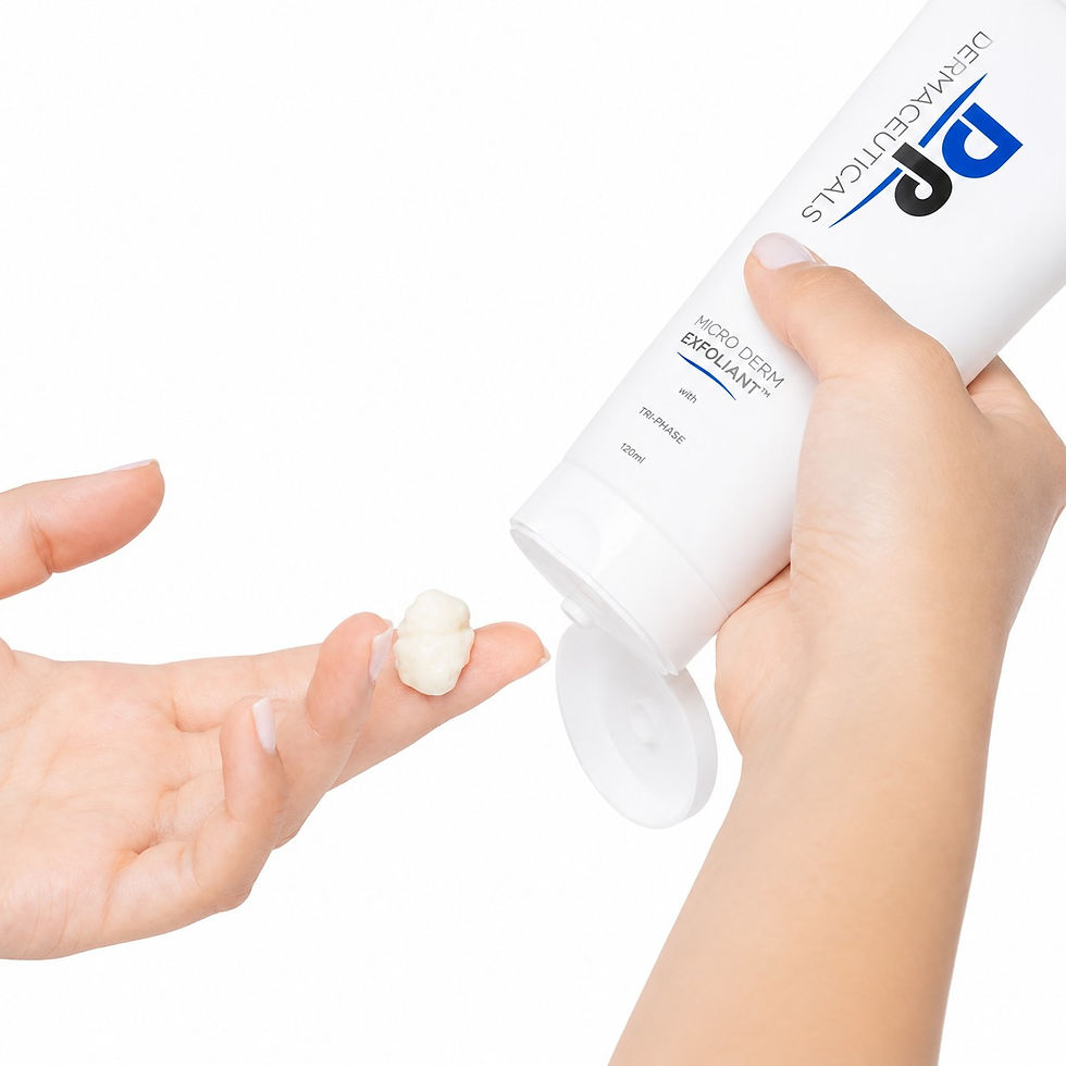 DP Dermaceuticals Micro Derm Exfoliant 150ml dispensed onto fingertips, showcasing the creamy physical facial exfoliant