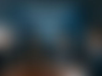 Diverse board members in a modern conference room discussing cybersecurity, with a digital screen displaying "Cybersecurity for Boards" and security icons in the background.