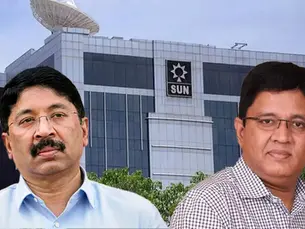 Maran Brothers, prominent leaders of Sun Group, standing in front of Sun TV Network headquarters in Chennai