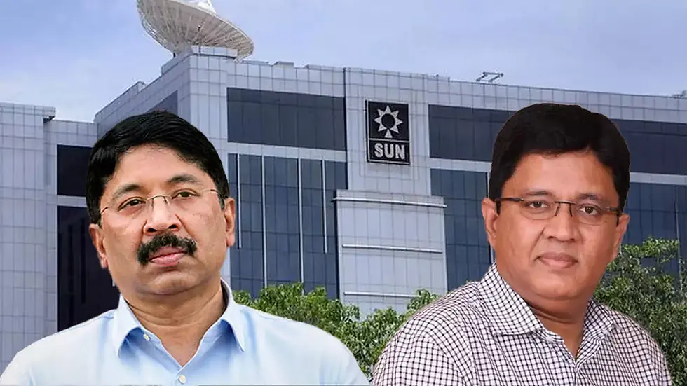 Maran Brothers, prominent leaders of Sun Group, standing in front of Sun TV Network headquarters in Chennai