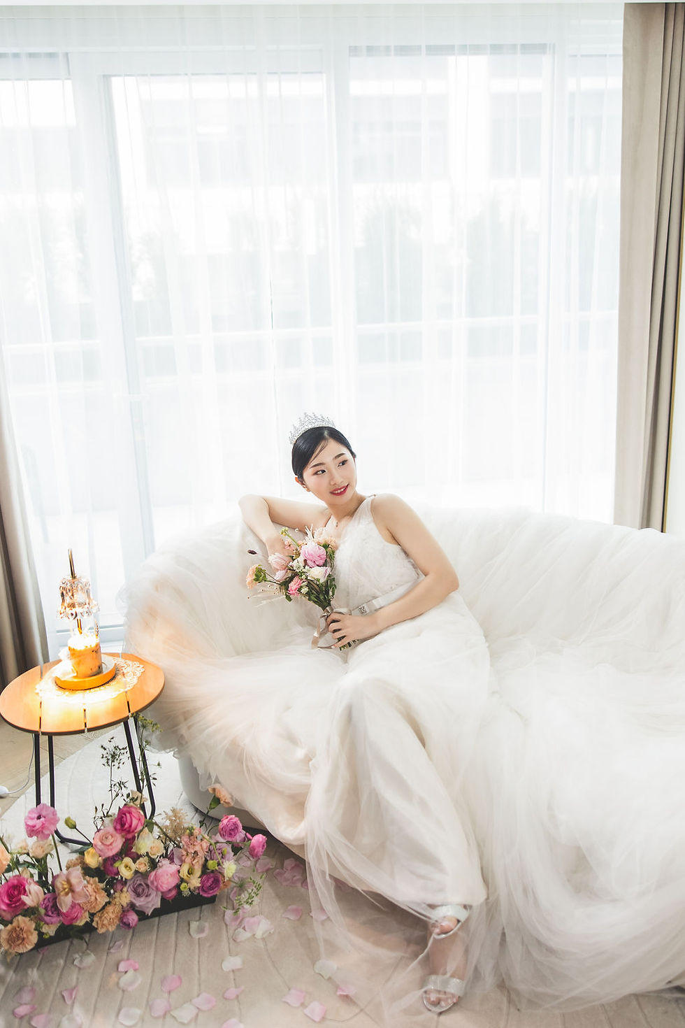 In this captivating image, a loving couple stands against the elegant backdrop of Azur Hotel, their special day artfully frozen in time by our skilled Vancouver wedding photographer, showcasing a perfect blend of romance and expertise in every frame