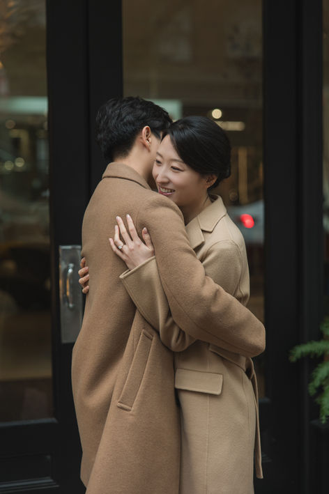 Candid engagement photo of a couple in Vancouver by The Eunice & Co.