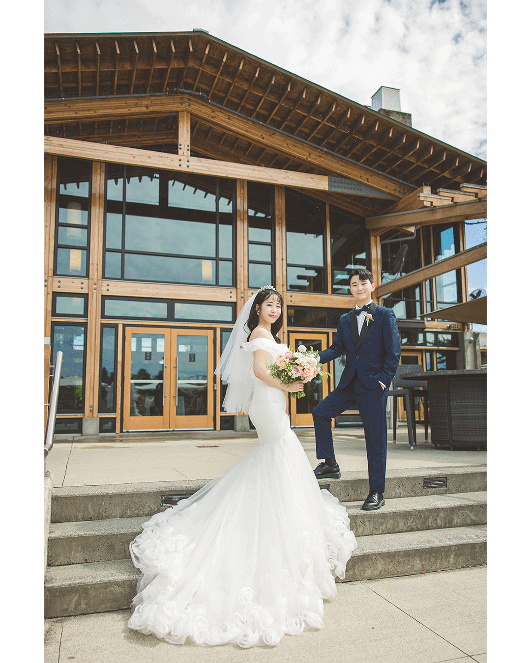 A joyous couple celebrating their love at the Riverway Clubhouse, surrounded by elegance and beauty