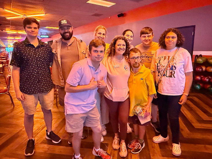 connection crew bowling together, enjoying friendly competition and social connection during the 2026 bowling event.