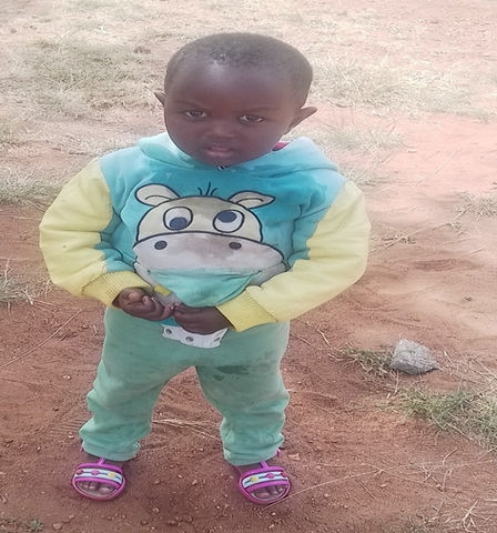 Joan Semeyian raised by single mother who volunteer to clean school compound. needs basic and educat