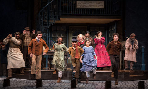 Aaron in the ensemble of the Goodman Theatre's annual production of A CHRISTMAS CAROL in 2016