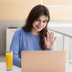 attractive-young-woman-communicates-by-video-calling-while-sitting-cafe.jpg