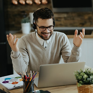 young-happy-entrepreneur-having-video-call-computer-home.jpg
