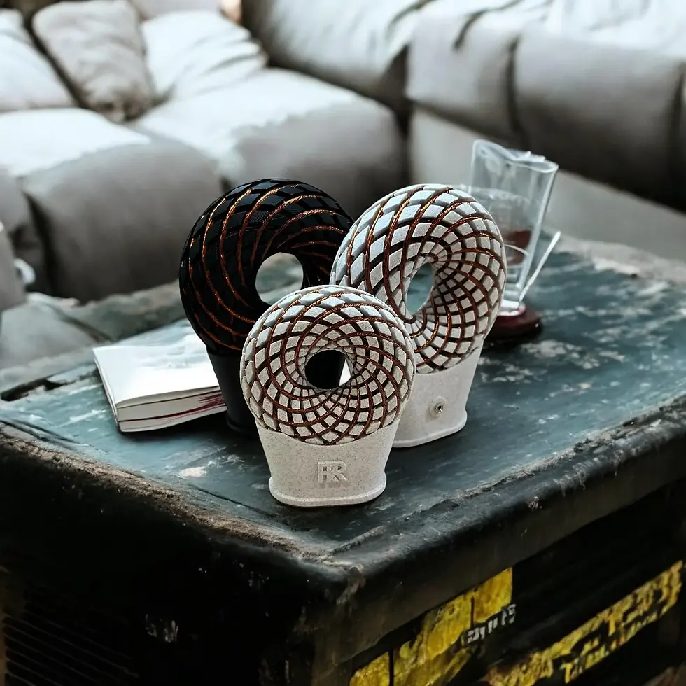 Close-up view of a PEMF healing device on a soft surface