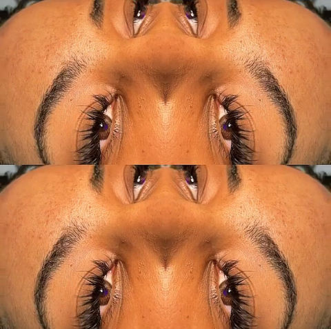 Four mirrored close-up images of hybrid lash extensions.