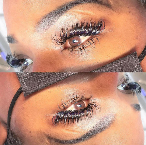 Close-up of lash extension application process on brown eyes.