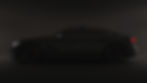 a 3d car placed in dark background