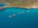 Flotte des maxi catamarans d'AMC Cape Grace au mouillage dans un cadre paradisiaque dans le golfe de Saint-Tropez