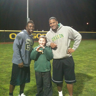 Kenjon Barner, Kanen Rossi and Ed Dickson
